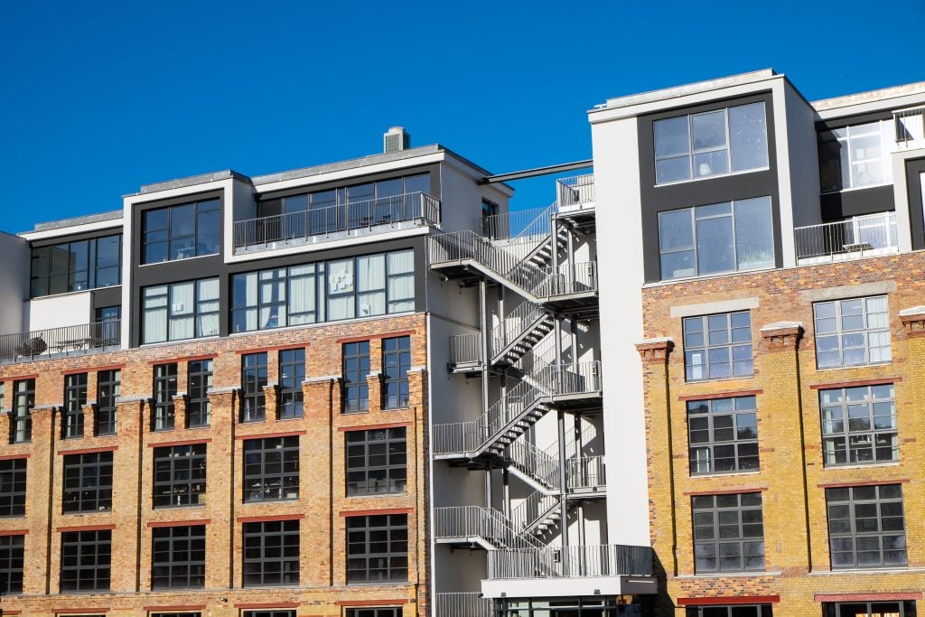 Converted industrial building used for commercial or mixed-use property investment in the UK.