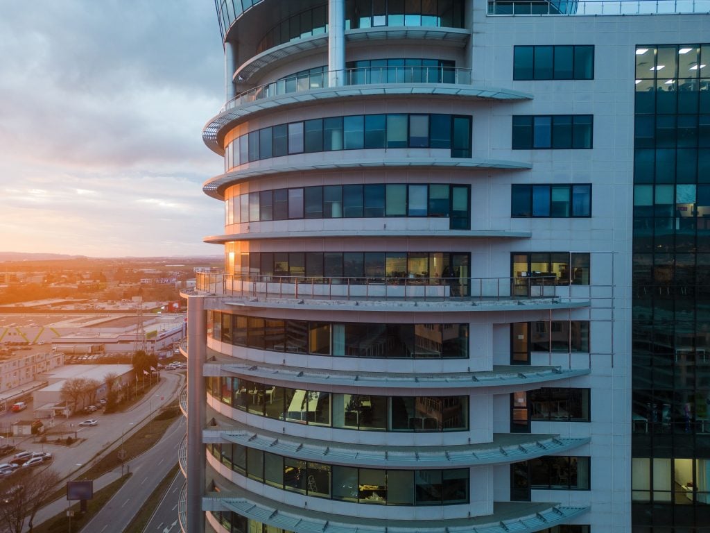 Aerial view of commercial property building in the UK during sunset.